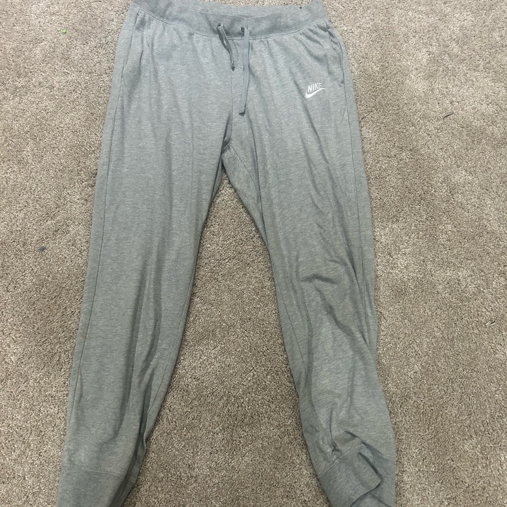 Nike sweatpants SMALL hole on back of leg (picture 3)